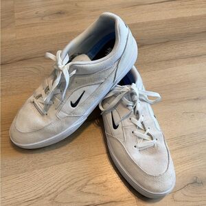 Nike Men's Off-White Sneakers with Black Swoosh